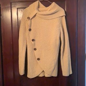 Medium cowl neck tan sweater.